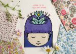 Cross-stitch pattern of a girl with a crown from XStitch 2021 Calendar - Reflex.